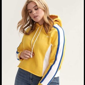 Yellow Levi’s cropped hoodie